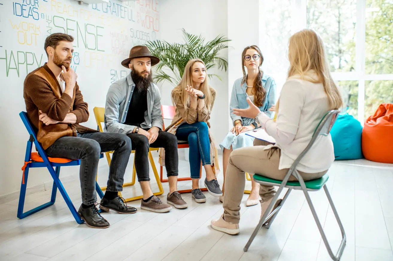 people in a group therapy session