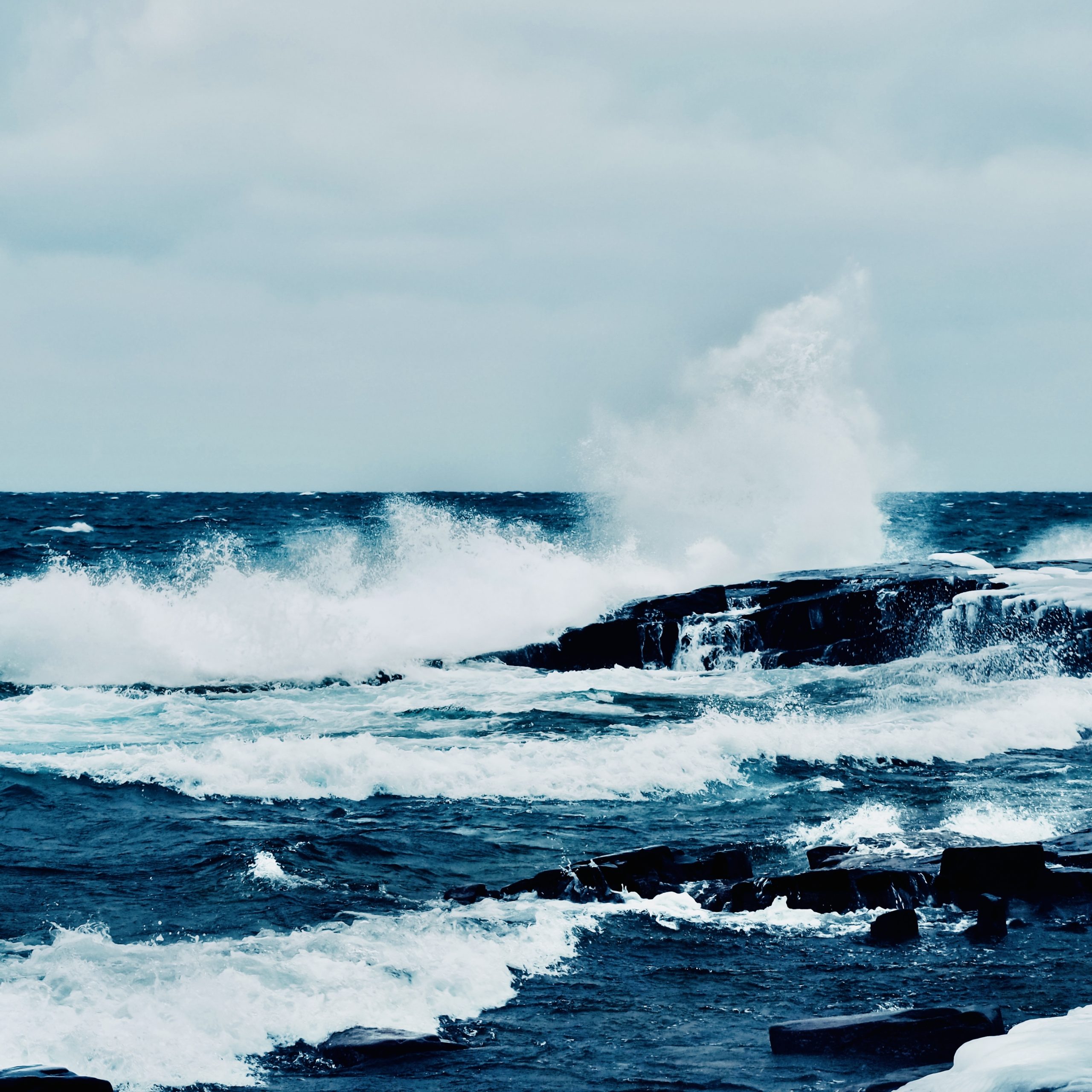 Waves crashing on rocks